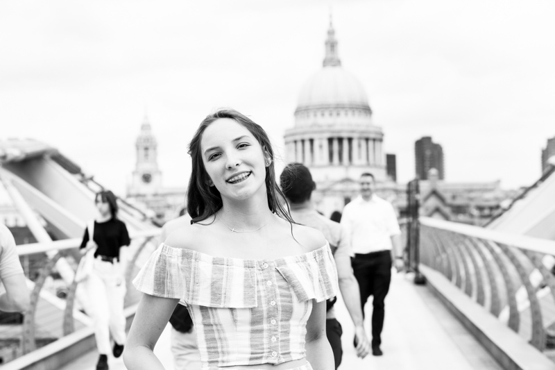 Girl standing in front of St Paul's Cathedral. 