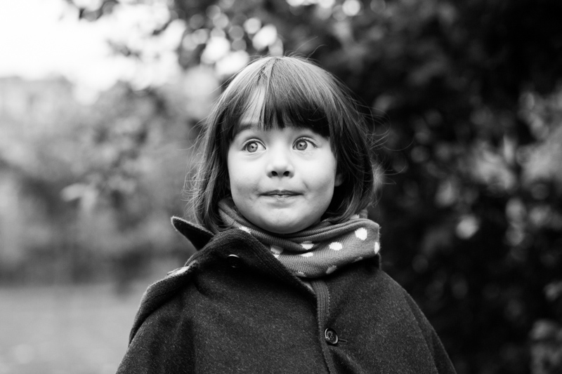 little girl pulling a funny face.