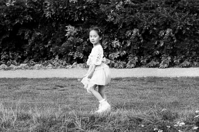 Girl walking across the grass. 