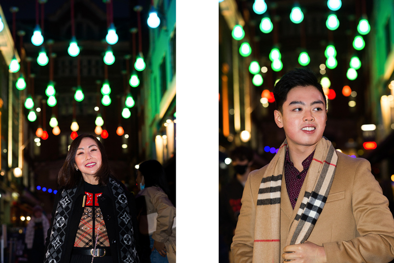 Lady and man with Christmas lights. 