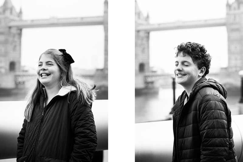 Girl and boy in front of Tower Bridge. 