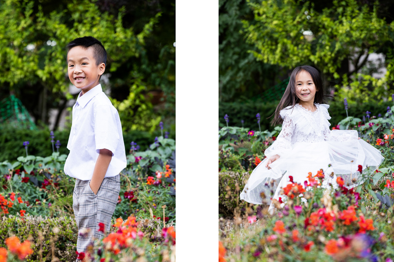 boy and girl smiling amongst beautiful flowers