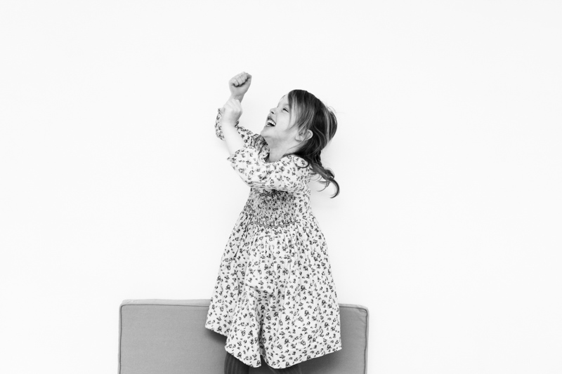 girl in flowery dress dancing