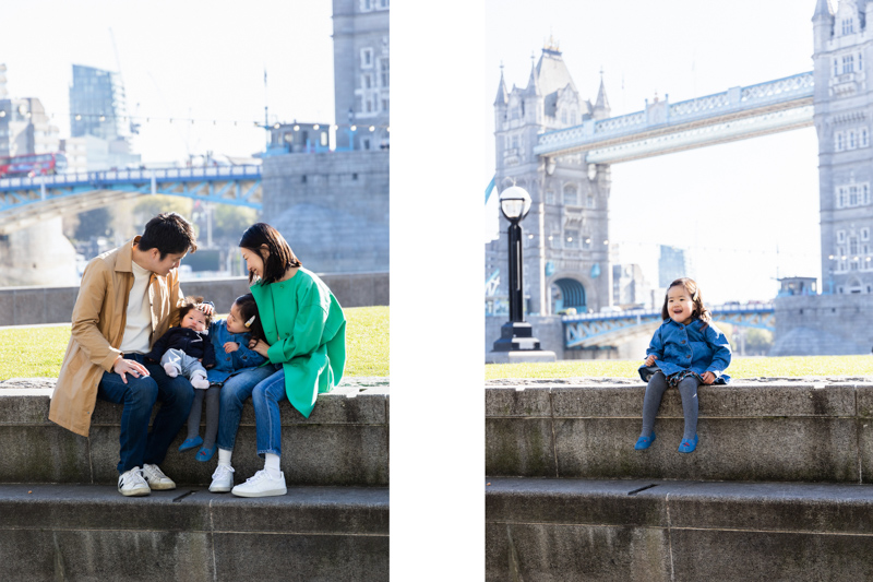Family of four in front of Tower Bridge | Little girl wearing denim dress, sitting in front of Tower Bridge