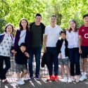 happy portrait of a family of eight