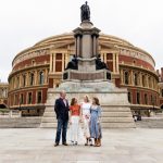 Four people standing in front of the Royal Albert Hall