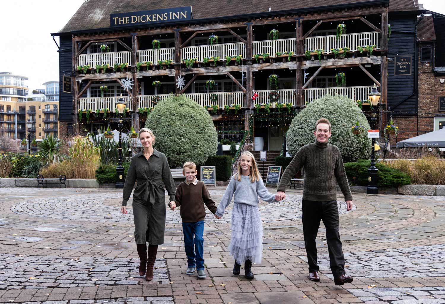 Family photo outside The Dickens Inn at St Katherine Docks