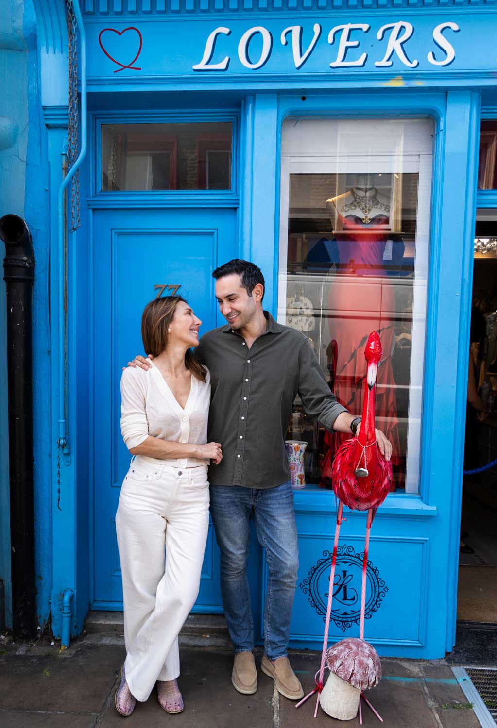Photo of a couple in front of a shop in Notting HIll